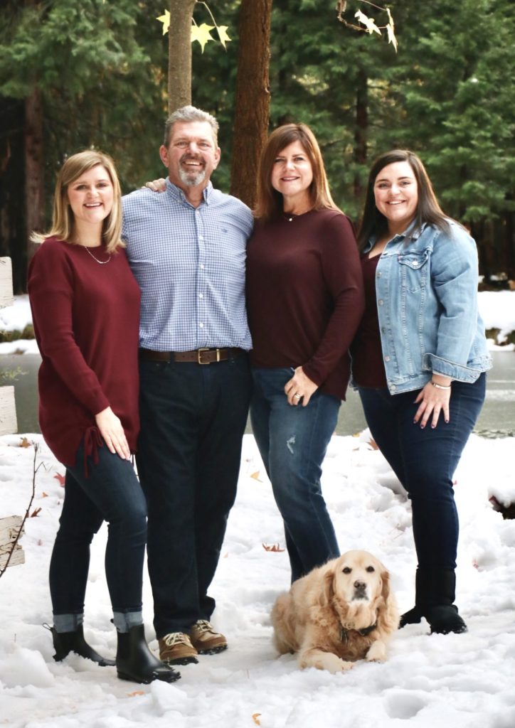 Craig Johnson, his wife Denise, and their two daughters